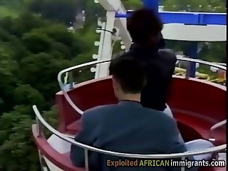 African babe gets pumped at ferris Wheel