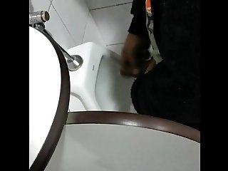 friend jerking off at urinal